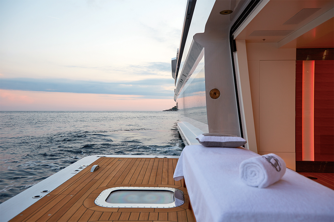 The deck features a massage spa bed to relax after a nice swim.