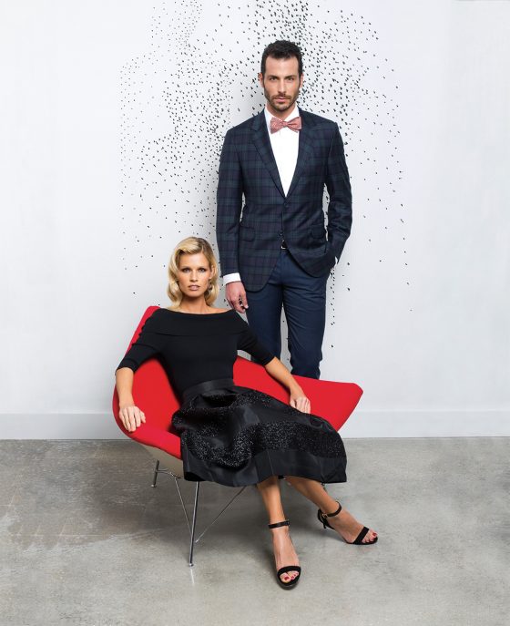 HER: Off the Shoulder Knit Top by Eliza J, $98, available at Nordstrom. Jacquard Pleated Glittery Midi Skirt by Eliza J, $168, available at Nordstrom. ‘Hyacinth’ Ankle Strap Sandals by Louise et Cie, $128.95, available at Nordstrom. Navette Teardrop Chandelier Earrings by Nordstrom Rack, $16.97, available at Nordstrom Rack. HIM: Plaid Blazer by Maus & Hoffman, $1,095, available at Maus & Hoffman. Silk Bowtie by J. McLaughlin, $85, available at Nordstrom. Striped Fitted Pants by Hugo Boss, $225, available at Nordstrom. Classic Fit French Cuff Tuxedo Shirt by John W. Nordstrom, $59.90, available at Nordstrom.