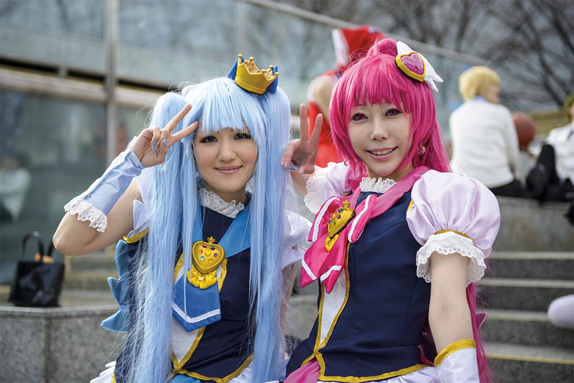 Girls dressed as anime characters pose at a cosplay gathering in Harajuku. Photography: Shutterstock / Sean Pavone.