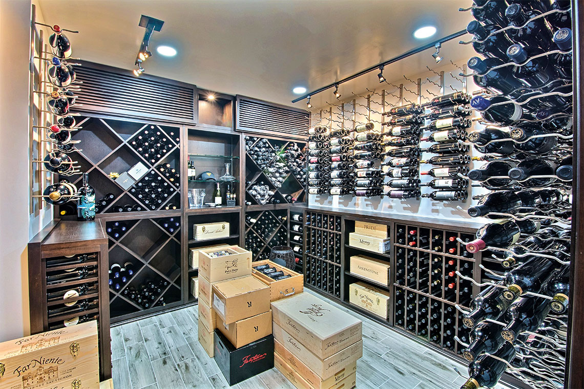 A custom temperature-controlled wine cellar holds more than 1,000 bottles. Photography: Barkin-Gilman & Associates, Coldwell Banker Global Luxury.