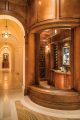The walk-in wine cellar equipped with a collection of wine favorites. Photography: The Tim Elmes Group of Coldwell Banker Global Luxury.