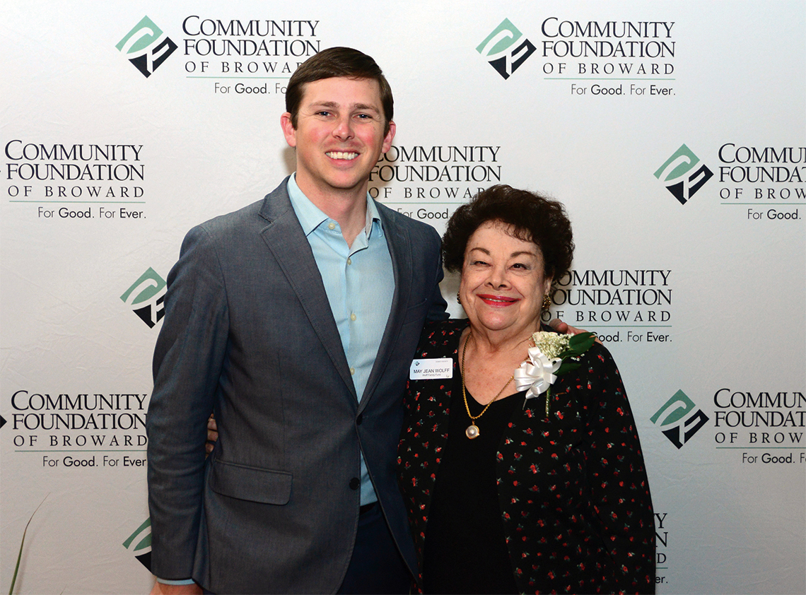 Guest speaker Mac Stone with member May Jean Wolff