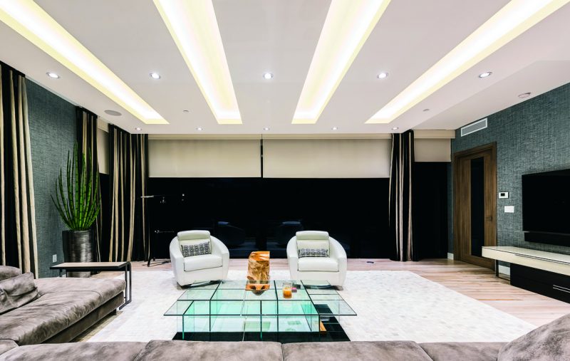 Custom designed drop ceilings with LED cover lighting were added to the great room. Photography: John Paul Nadeau.