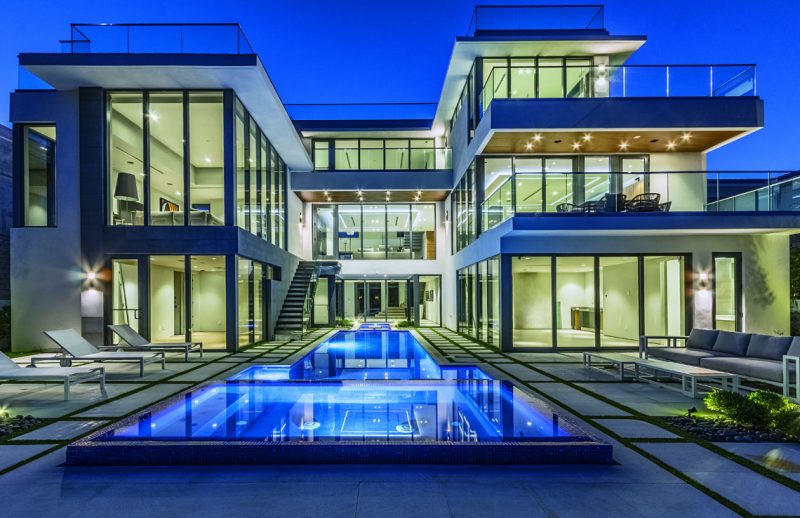 The home is solid concrete and steel construction. The pool is 50×15 and six feet deep with electrical heater and spa. Photography: Myro Rosky Photography.