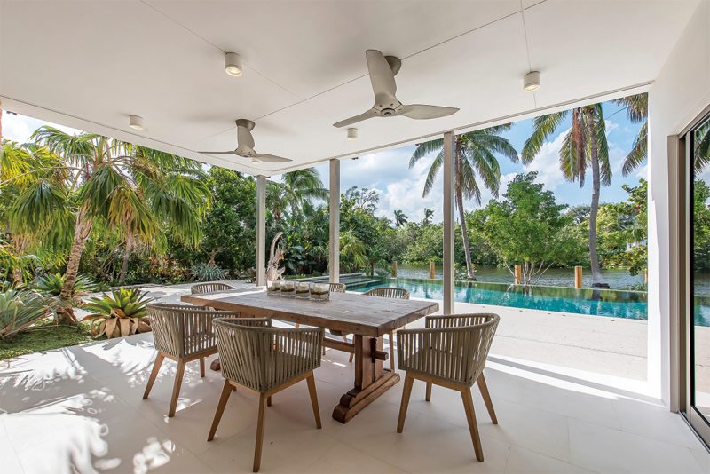 The ceiling fans in the exterior patios and bedrooms are by Haiku Home. Photography: Tim Singer & Associates, Coldwell Banker Florida.