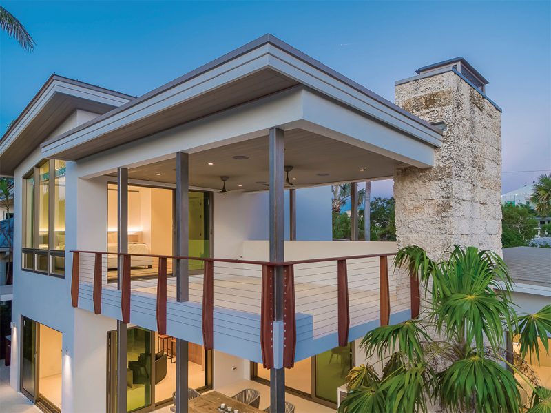 All sliding door openings in the home feature retractable, sliding insect screens and most are dual-operating with a solar sun shade component as well. Photography: Tim Singer & Associates, Coldwell Banker Florida.