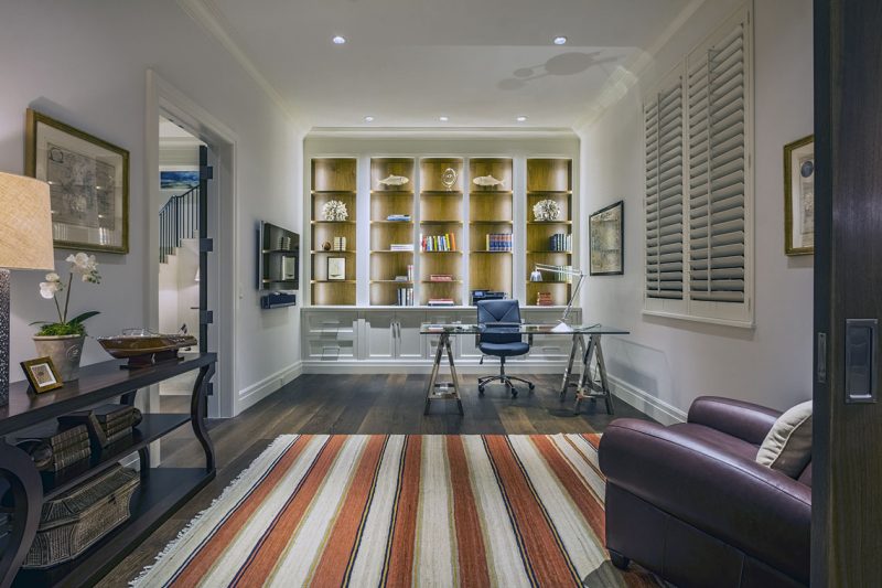 The home also features 11-foot ceilings, an elevator, fireplace and foyer entry.