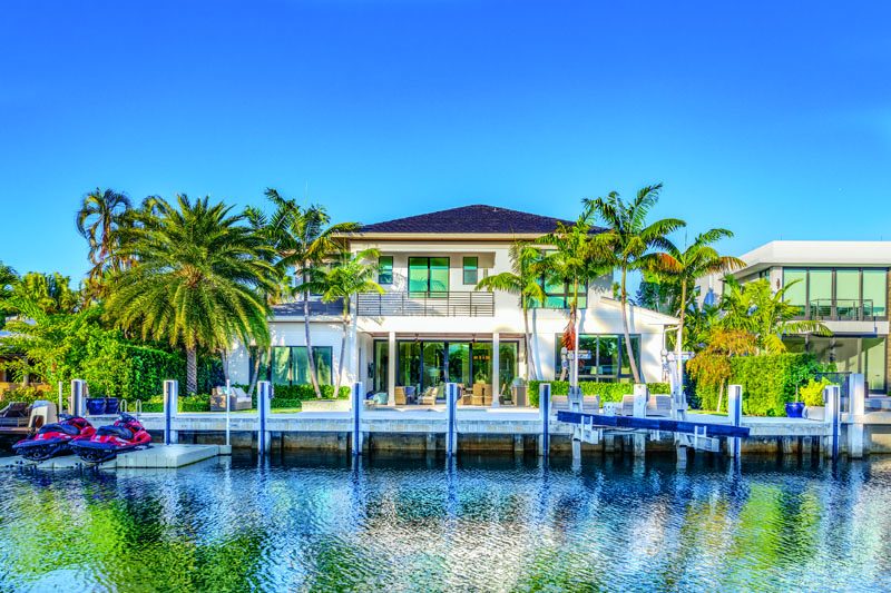 The waterfront property features a private dock and a canal width of 81 to 120 feet. Photography Courtesy of Todd Kirkpatrick, Whitaker Realty.